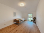 SCHLAFZIMMER I - Obergeschosswohnung im Herzen von Bernau am Chiemsee