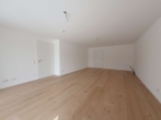 WOHNRAUM - Erstbezug / Stilvolle Neubauwohnung mit Terrasse und Grünfläche