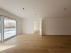WOHNRAUM - Erstbezug / Stilvolle Neubauwohnung mit Terrasse und Grünfläche