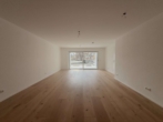 WOHNRAUM - Erstbezug / Stilvolle Neubauwohnung mit Terrasse und Grünfläche