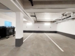 TIEFGARAGENSTELLPLATZ - Erstbezug / Stilvolle Neubauwohnung mit Terrasse und Grünfläche