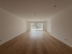 WOHNRAUM - Erstbezug / Stilvolle Neubauwohnung mit Terrasse und Grünfläche