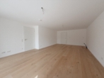 WOHNRAUM - Erstbezug / Stilvolle Neubauwohnung mit Terrasse und Grünfläche